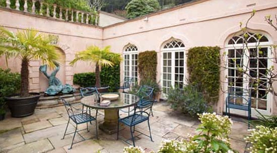 A courtyard garden provides a sheltered outdoor entertaining space
