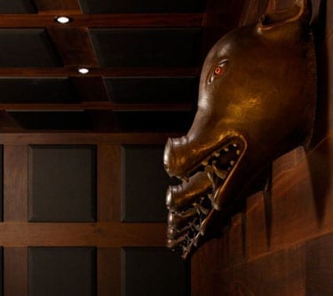 A scary looking boar's head looks over the political plotting at the Blue Boar
