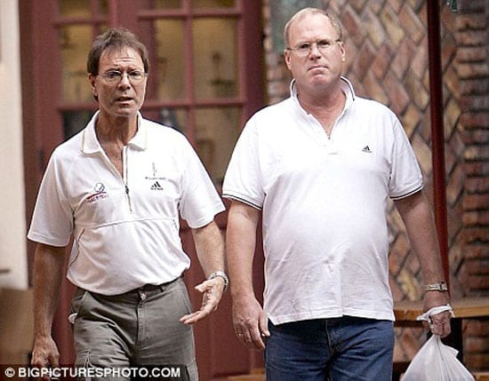 Cliff Richard pictured with a friend whom he prefers to be described as his "companion"