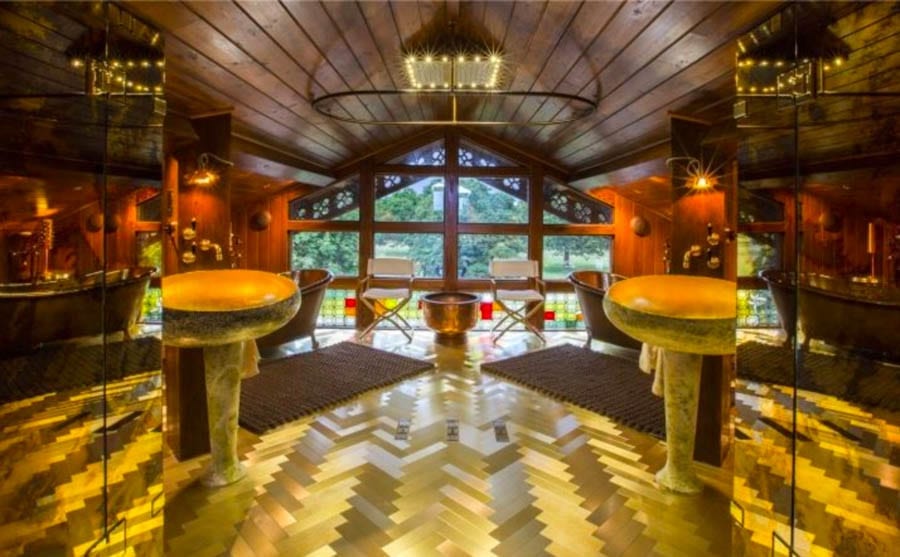 A Cut Cost Chalet – The Chalet, Hampton Court Road, East Molesey, Surrey, KT8 9BP – UK’s weirdest home for sale for a sum 61% lower than its 2016 £13m asking price; it has been repossessed and comes with a huge indoor beach – On the market with Savills for £5 million ($6.9 million, €5.6 million or درهم25.3 million) on behalf of LPA Receivers in March 2018; down from £13 million ($17.9 million, €14.6 million or درهم65.9 million) in August 2016.