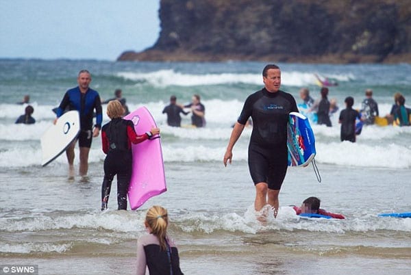 David Cameron will not ride the waves of public opinion by being seen surfing at this time