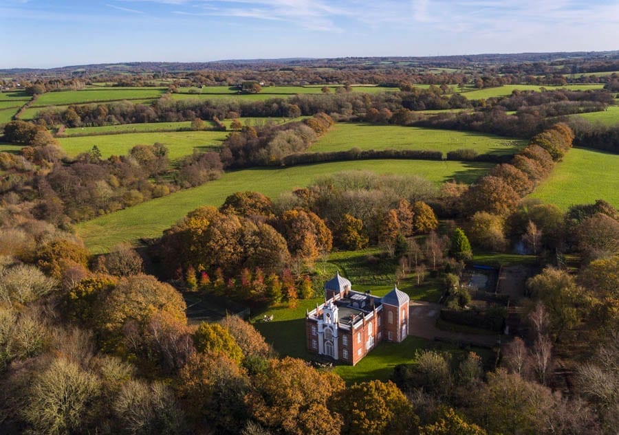 A Modern Masterpiece – Victorian farmhouse transformed into an Anglo-Baroque-style masterpiece by Robert Adam complete with a lion from Chuchill’s garden on the roof for sale through Savills for £2.45 million ($3.1 million, €2.8 million or درهم11.4 million) – Eastwood Farm, Chilsham Lane, Herstmonceux, Hailsham, East Sussex, BN27 4QH.