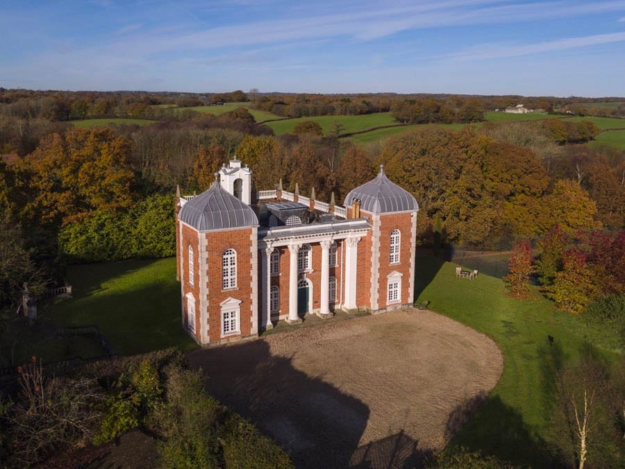 A Modern Masterpiece – Victorian farmhouse transformed into an Anglo-Baroque-style masterpiece by Robert Adam complete with a lion from Chuchill’s garden on the roof for sale through Savills for £2.45 million ($3.1 million, €2.8 million or درهم11.4 million) – Eastwood Farm, Chilsham Lane, Herstmonceux, Hailsham, East Sussex, BN27 4QH.