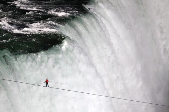 In June, a tightrope walker, Nik Wallenda, defied mist and wind to become the first man to walk across Niagara Falls on a high wire. His achievement was not only daring but also spectacular.