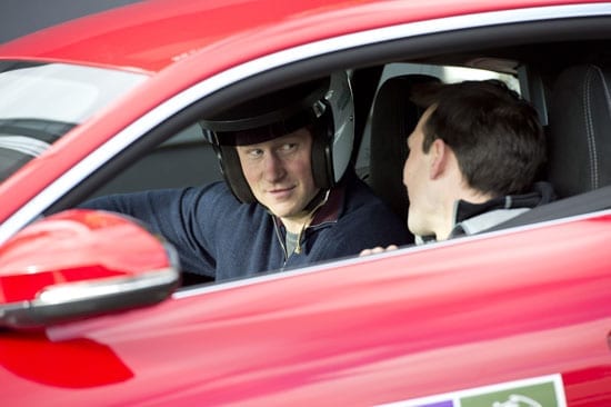 Prince Harry getting ready to drive a Jaguar F-Type