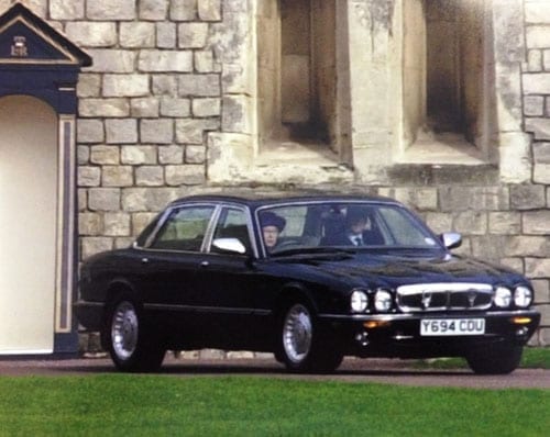 The Queen driving her Daimler Super V8, registration Y694 CDU, at Windsor Castle