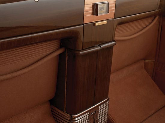 The car features three cigar lighters, two ashtrays, a humidor and a custom rack for The Duke's favoured Sasieni pipes