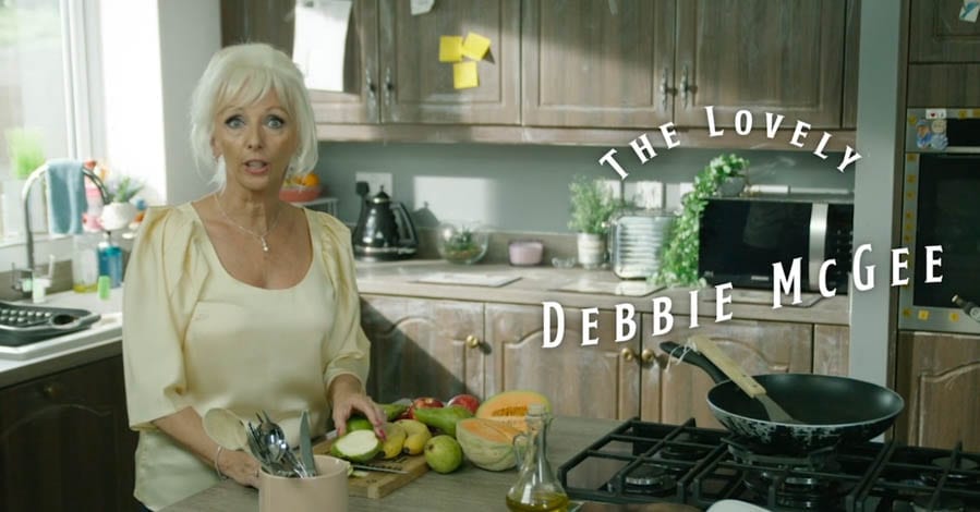 McGee Magic – Debbie McGee appears in advert for crappy kitchen makeover company Kitchen Magic – “The Lovely Debbie McGee” hits a new low in appearing in adverts for a crappy kitchen makeover company (with captions across her cleavage).