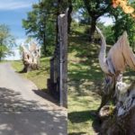 A-fire-breathing-sculpture-of-a-dragon-stands-at-the-entrance-gates-of-the-castle