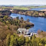 An-aerial-shot-of-the-unfinished-house-and-Lilymere-Lake-1