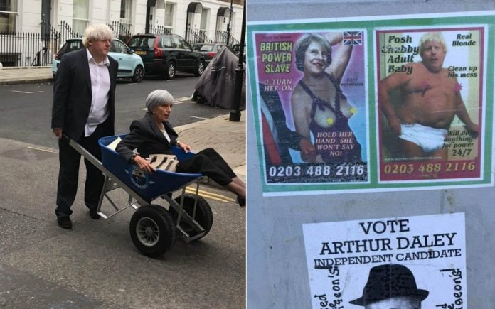 Theresa Calls By – Theresa May spotted in wheel barrow – Boris Johnson pictured wheeling Theresa May around Chelsea in a wheel barrow whilst elsewhere the pair of them make themselves known in a phone box