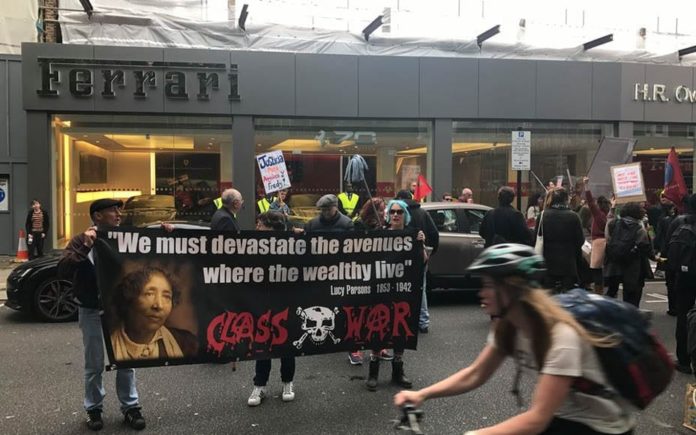 Commie Ferraris – Ragbag of Communist protestors descend on H. R. Owen Ferrari dealership in South Kensington screaming: “Kill the Rich!”