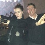 Nell-Diamond-and-her-father-Bob-Diamond-perform-what-is-known-as-the-diamond-gesture-at-a-Jay-Z-concert
