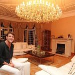 Pablo-Teixeira-pictured-in-a-rather-gaudy-living-room