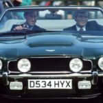 Charles And Bodyguard Aston Martin
