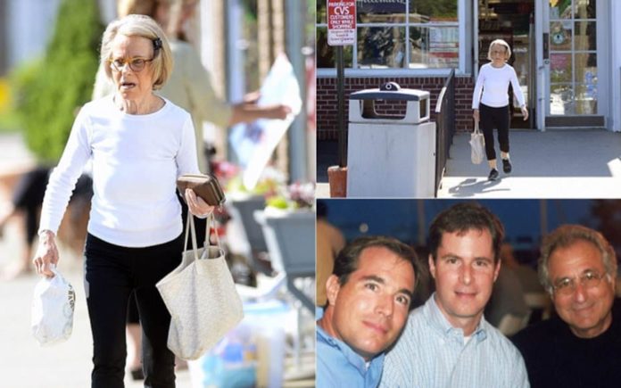 Meltdown Madoff – Bernard Madoff family finally relieved of their ill-gotten gains; victims now get back approximately 66% of losses whilst Ruth Madoff goes shopping – Pictured: Ruth Madoff shopping (left and top right); Mark, Andrew and Bernard Madoff pictured together in 2001 (bottom right).