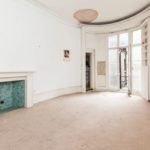 The-bedroom-leads-to-the-kitchen-and-the-bathroom-beyond-currently-1