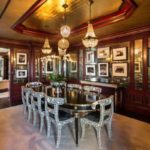 The-formal-dining-room-is-currently-used-to-display-an-array-of-black-and-white-photographs