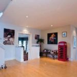 The-hallway-includes-a-bizarre-minature-phone-box-1