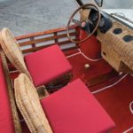 The-interior-of-the-car-is-especially-eccentric-and-features-garden-chair-type-seating-and-rowboat-style-woodwork