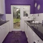 The-kitchen-doesnt-escape-the-purple-touch-either-with-walls-and-flooring-in-the-owners-favourite-colour-1