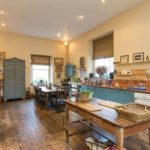 The-kitchen-has-a-distinctly-country-house-feel-to-it-and-includes-an-AGA-and-dining-area