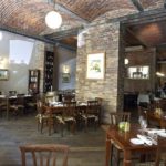 The-main-dining-space-has-a-charming-barrel-vaulted-ceiling