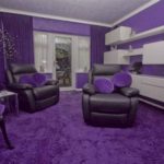 The-sitting-room-starts-the-theme-off-with-a-most-enthusiastic-use-of-purple-dominating-the-decor-scheme-1