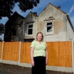 Wendy-Collins-stands-on-land-belonging-to-her-neighbours-1