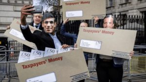 Picture of the Week – Cesspit Street – Protestors brandishing envelopes of ‘taxpayers’ money’ sum up the state of Boris Johnson’s rotten government as ex-minister Johnny Mercer quite rightly brands it a “cesspit”